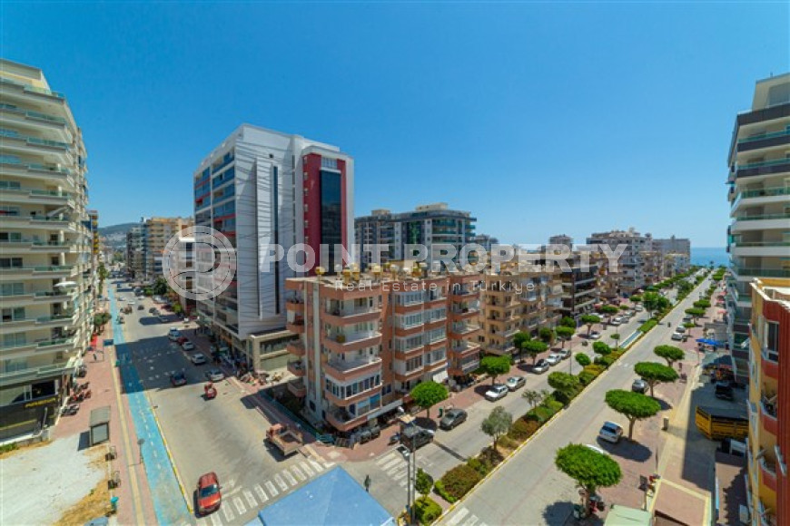 Большая двухуровневая квартира на 11-м этаже с мансардой в центре современного района Махмутлар.-id-4200-фото-17