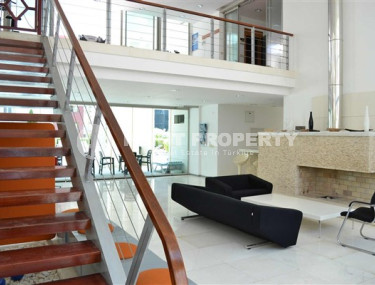 Panoramic duplex with fine finishing on the 11th floor with an attic in the center of Mahmutlar.-id-4201-photo-1