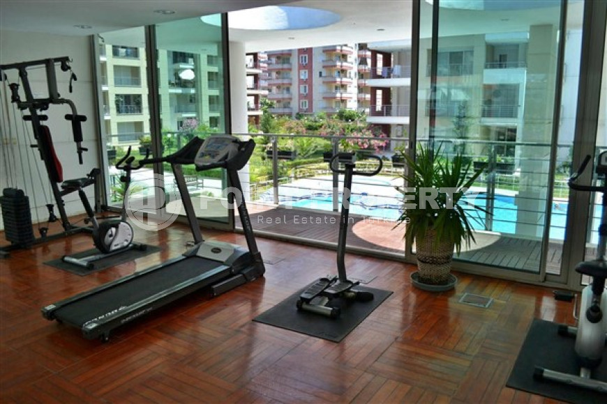 Панорамный дуплекс с чистовой отделкой на 11-м этаже с мансардой в центре района Махмутлар.-id-4201-фото-17