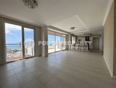 Panoramic duplex with fine finishing on the 11th floor with an attic in the center of Mahmutlar.-id-4201-photo-2