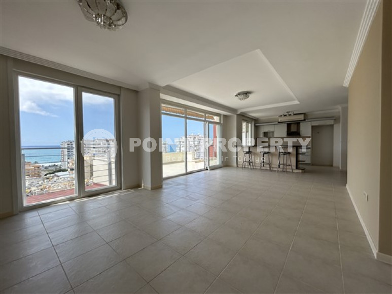 Панорамный дуплекс с чистовой отделкой на 11-м этаже с мансардой в центре района Махмутлар.-id-4201-фото-2