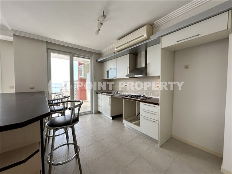 Панорамный дуплекс с чистовой отделкой на 11-м этаже с мансардой в центре района Махмутлар.-id-4201-фото-3