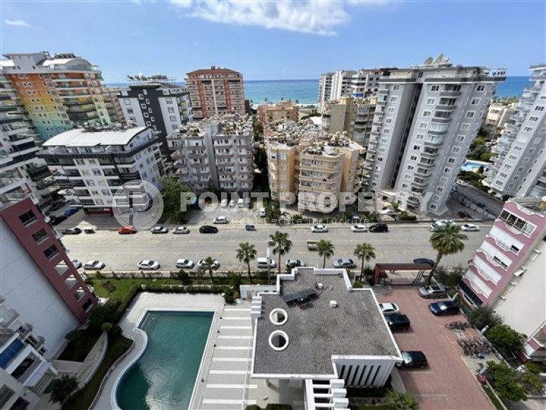 Панорамный дуплекс с чистовой отделкой на 11-м этаже с мансардой в центре района Махмутлар.-id-4201-фото-18