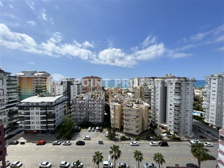 Панорамный дуплекс с чистовой отделкой на 11-м этаже с мансардой в центре района Махмутлар.-id-4201-фото-20