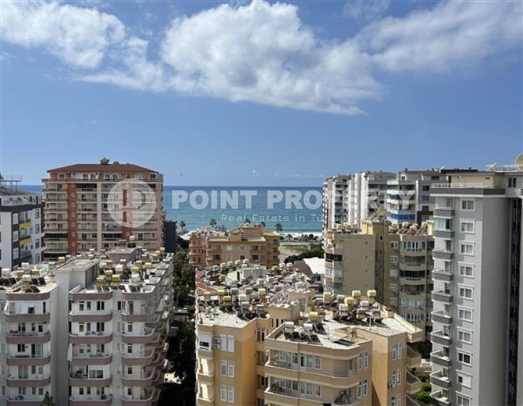 Панорамный дуплекс с чистовой отделкой на 11-м этаже с мансардой в центре района Махмутлар.-id-4201-фото-19