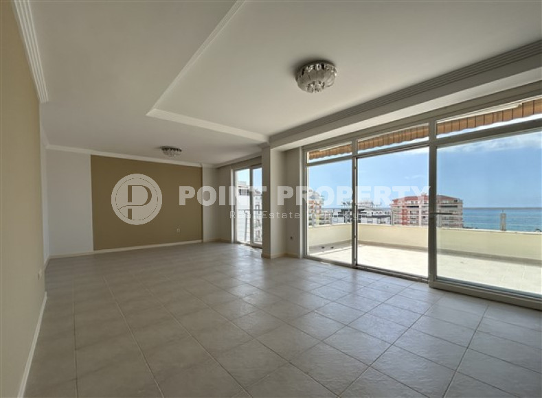 Панорамный дуплекс с чистовой отделкой на 11-м этаже с мансардой в центре района Махмутлар.-id-4201-фото-7