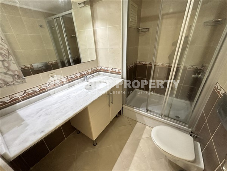 Панорамный дуплекс с чистовой отделкой на 11-м этаже с мансардой в центре района Махмутлар.-id-4201-фото-12