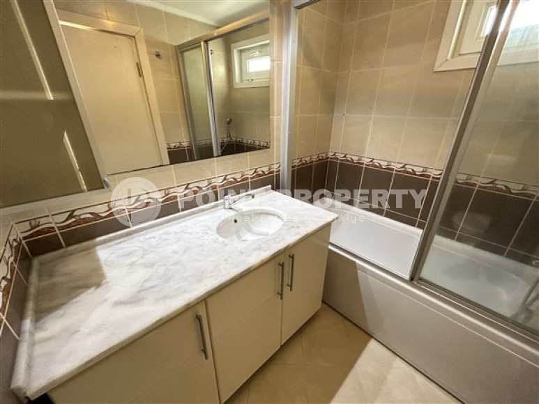 Панорамный дуплекс с чистовой отделкой на 11-м этаже с мансардой в центре района Махмутлар.-id-4201-фото-11