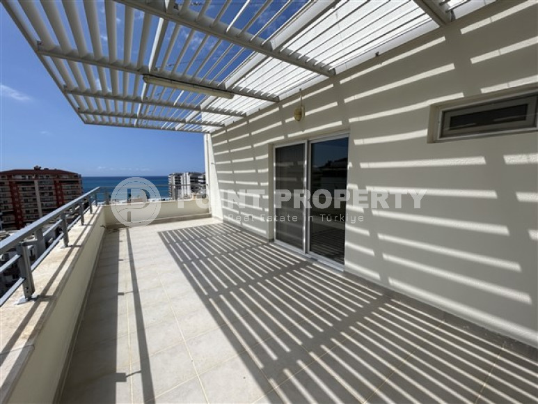 Панорамный дуплекс с чистовой отделкой на 11-м этаже с мансардой в центре района Махмутлар.-id-4201-фото-14