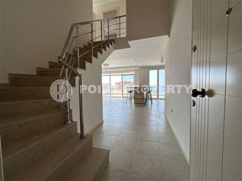 Панорамный дуплекс с чистовой отделкой на 11-м этаже с мансардой в центре района Махмутлар.-id-4201-фото-6