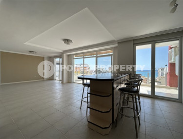 Панорамный дуплекс с чистовой отделкой на 11-м этаже с мансардой в центре района Махмутлар.-id-4201-фото-4