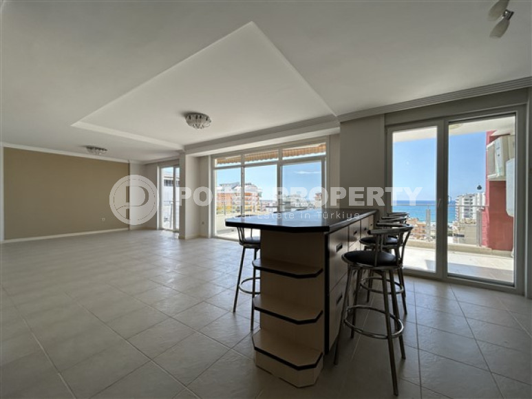 Панорамный дуплекс с чистовой отделкой на 11-м этаже с мансардой в центре района Махмутлар.-id-4201-фото-4