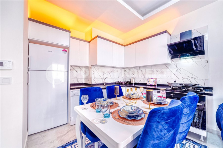 Cozy two-room apartment of 60 m2 in a new modern complex near the sea, Alanya-id-1346-photo-7