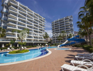 Elegant two-room apartment 1+1 with swimming pools and water park, Cikcilli area-id-4207-photo-1