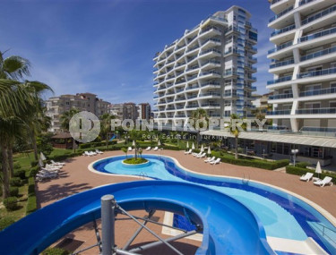 Elegant two-room apartment 1+1 with swimming pools and water park, Cikcilli area-id-4207-photo-2