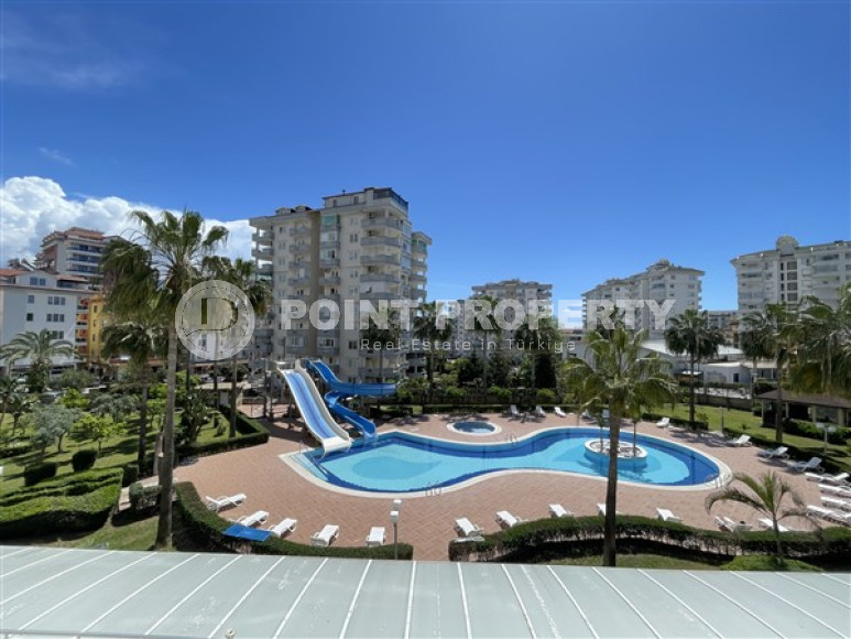 Элегантная двухкомнатная квартира 1+1 с бассейнами и аквапарком, район Джикджилли-id-4207-фото-12