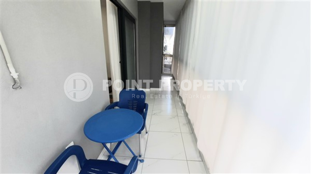 Compact furnished 1+1 apartment on the 2nd floor in a building built in 2019.-id-4209-photo-6