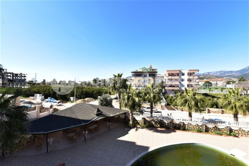 Недорогая меблированная квартира 1+1 в 800 метрах от моря в зеленом экологически чистом районе Демирташ.-id-4211-фото-8