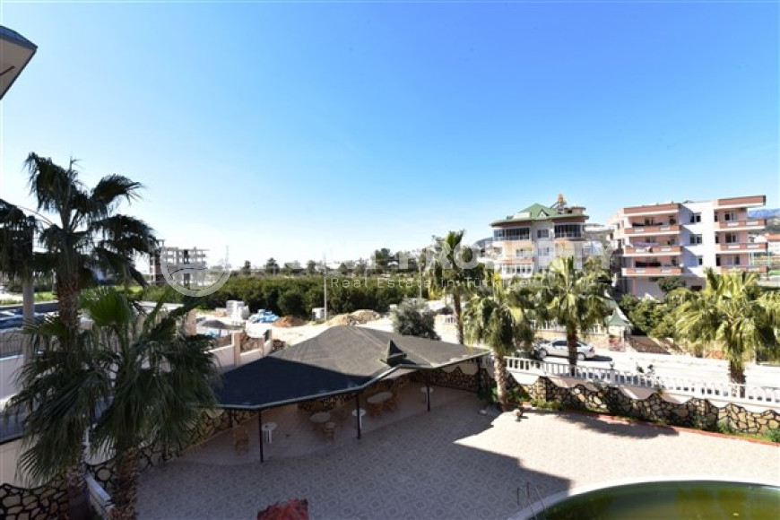 Недорогая меблированная квартира 1+1 в 800 метрах от моря в зеленом экологически чистом районе Демирташ.-id-4211-фото-9