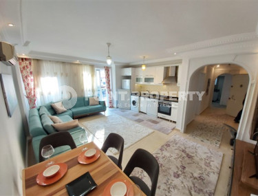 Меблированная квартира с двумя спальнями в 150 метрах от пляжа в центре популярного района Аланьи Махмутлар.-id-4222-фото-2