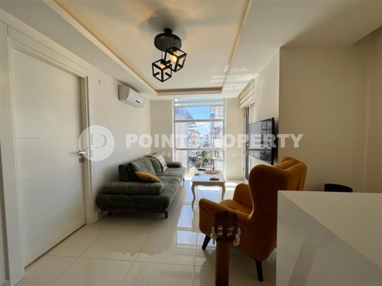 Небольшая светлая квартира 1+1 с хорошим ремонтом и современным дизайном в центре Аланьи.-id-4223-фото-2