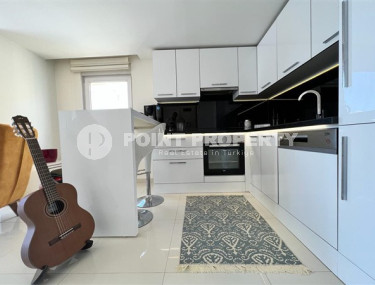 Небольшая светлая квартира 1+1 с хорошим ремонтом и современным дизайном в центре Аланьи.-id-4223-фото-4