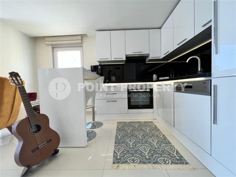 Небольшая светлая квартира 1+1 с хорошим ремонтом и современным дизайном в центре Аланьи.-id-4223-фото-4