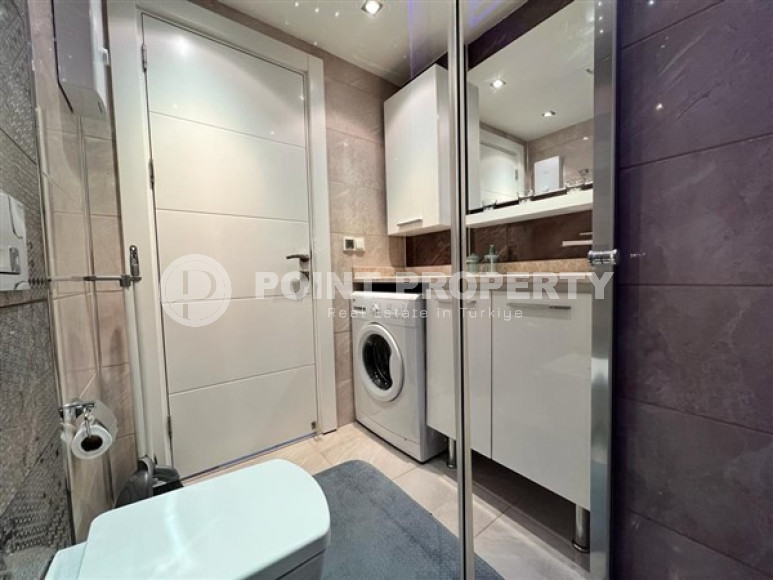 Небольшая светлая квартира 1+1 с хорошим ремонтом и современным дизайном в центре Аланьи.-id-4223-фото-9