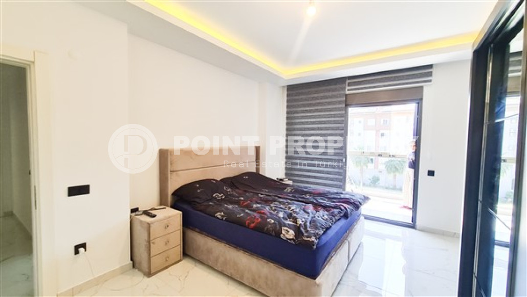 Beautiful modern apartment with two bedrooms 300 meters from the sea in the elite area of Kestel.-id-4230-photo-3