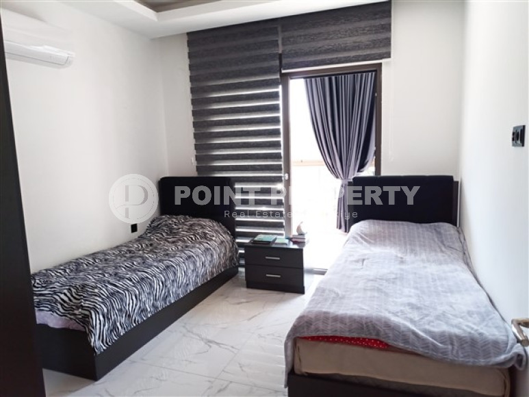 Beautiful modern apartment with two bedrooms 300 meters from the sea in the elite area of Kestel.-id-4230-photo-4