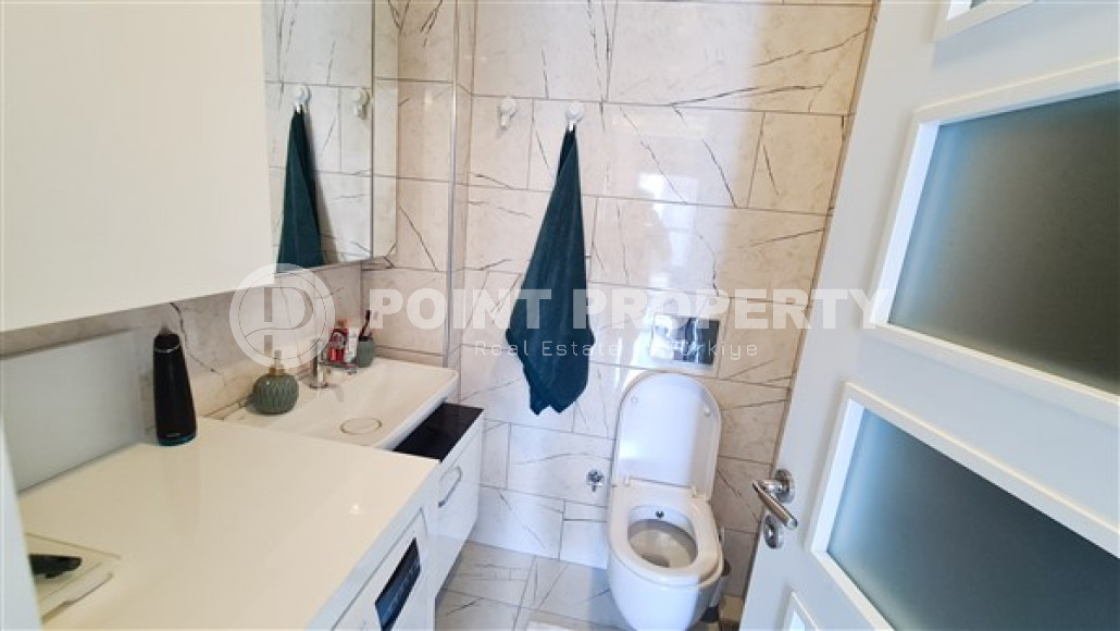 Beautiful modern apartment with two bedrooms 300 meters from the sea in the elite area of Kestel.-id-4230-photo-5