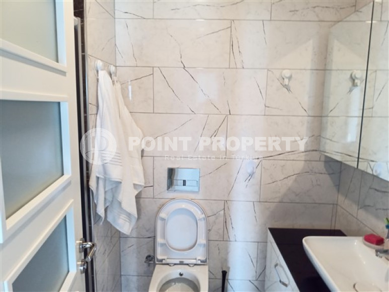 Beautiful modern apartment with two bedrooms 300 meters from the sea in the elite area of Kestel.-id-4230-photo-7