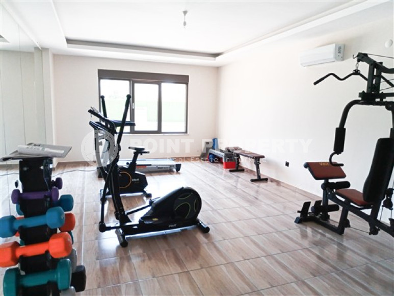 Beautiful modern apartment with two bedrooms 300 meters from the sea in the elite area of Kestel.-id-4230-photo-12