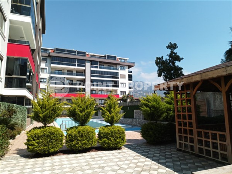 Beautiful modern apartment with two bedrooms 300 meters from the sea in the elite area of Kestel.-id-4230-photo-16