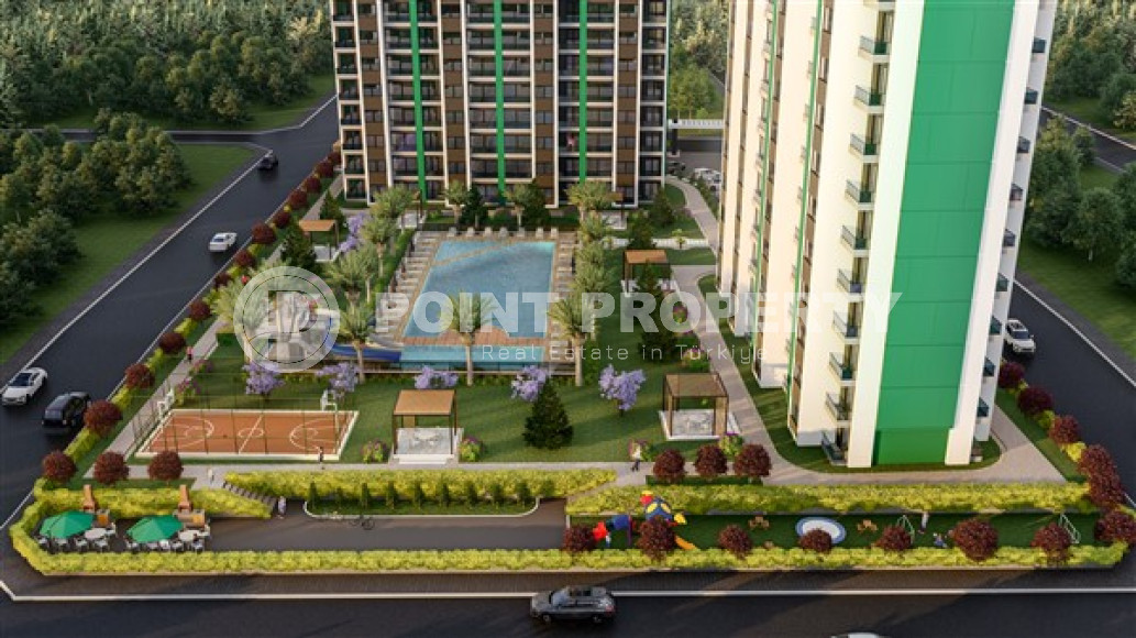 Два строящихся высотных жилых здания в районе Мезетли, Мерсин. Дата завершения работ в 2024 году.-id-4236-фото-8