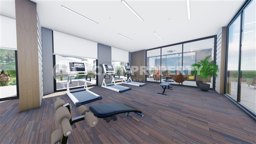 Инвестиционный проект в районе Мерсина, Томюк. Резиденция из 14 этажей в 600 метрах от моря.-id-4237-фото-3