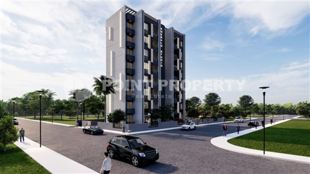 Трехкомнатные апартаменты в стильной строящейся семиэтажной резиденции в районе Тедже, Мерсин-id-4238-фото-1