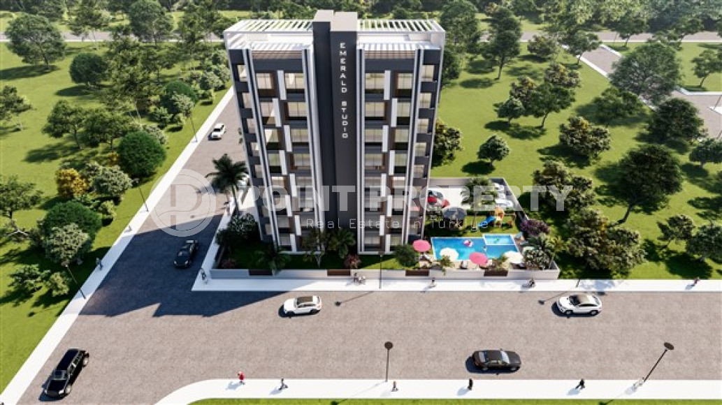 Трехкомнатные апартаменты в стильной строящейся семиэтажной резиденции в районе Тедже, Мерсин-id-4238-фото-4