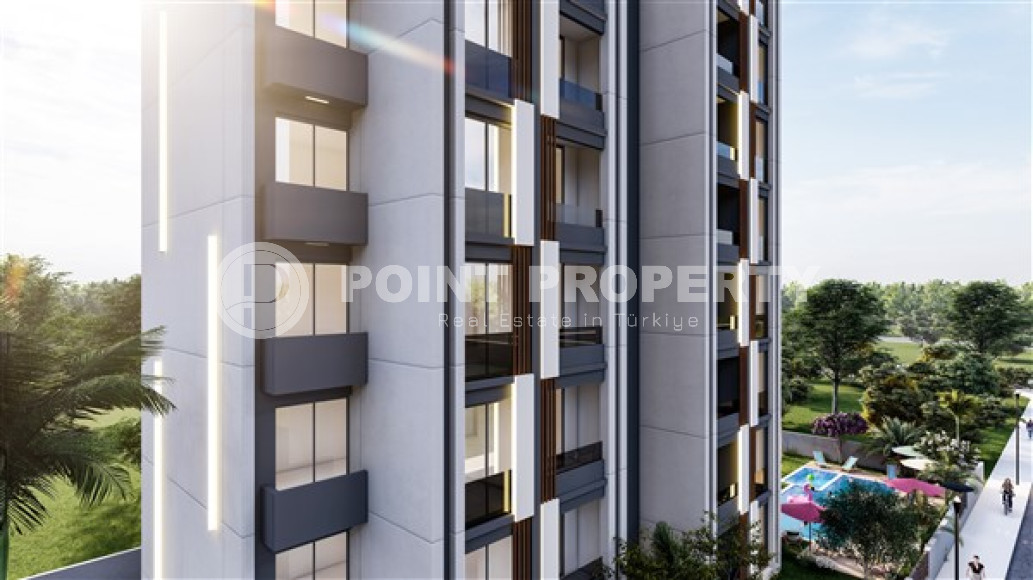 Трехкомнатные апартаменты в стильной строящейся семиэтажной резиденции в районе Тедже, Мерсин-id-4238-фото-9