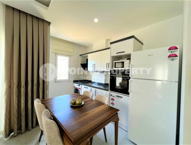 New furnished apartment with high-quality renovation and pleasant design in the center of Mahmutlar.-id-4247-photo-2