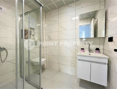 New furnished apartment with high-quality renovation and pleasant design in the center of Mahmutlar.-id-4247-photo-4