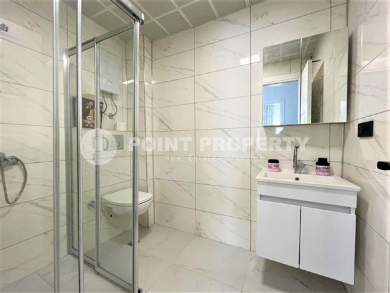 Новая меблированная квартира с качественным ремонтом и приятным дизайном в центре района Махмутлар.-id-4247-фото-4