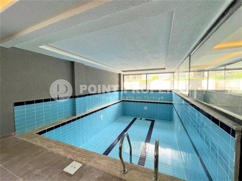 Новая меблированная квартира с качественным ремонтом и приятным дизайном в центре района Махмутлар.-id-4247-фото-7