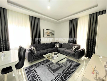 Stylish 1+1 apartment on the 3rd floor 700 meters from the sea in the center of the popular Mahmutlar area.-id-4248-photo-1