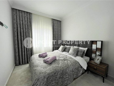 Stylish 1+1 apartment on the 3rd floor 700 meters from the sea in the center of the popular Mahmutlar area.-id-4248-photo-4