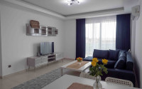 Bright modern apartment on the 7th floor with panoramic sea views in the center of the ecologically clean area of cozy Tosmur.-id-4253-photo-1