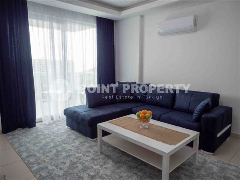 Bright modern apartment on the 7th floor with panoramic sea views in the center of the ecologically clean area of cozy Tosmur.-id-4253-photo-2