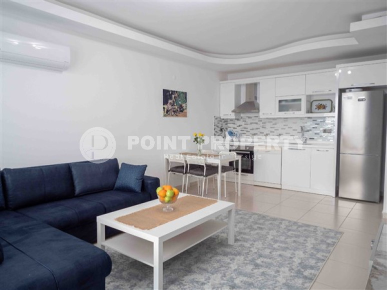 Bright modern apartment on the 7th floor with panoramic sea views in the center of the ecologically clean area of cozy Tosmur.-id-4253-photo-3