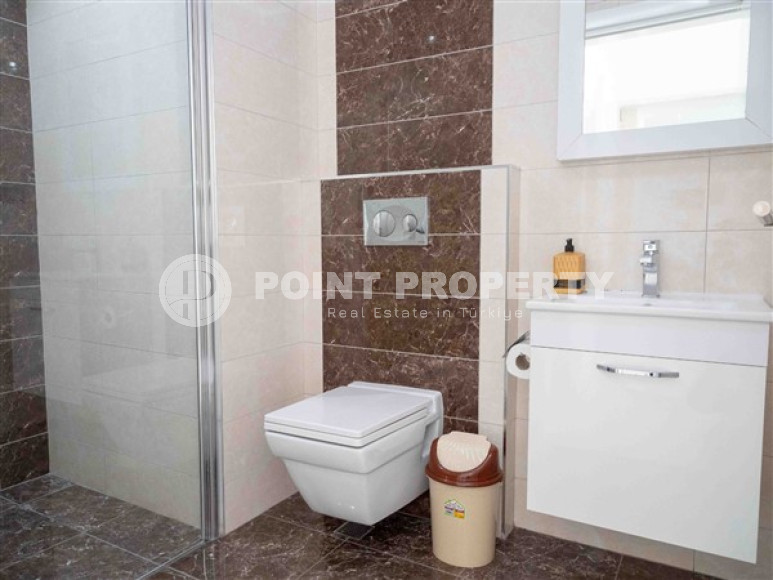 Bright modern apartment on the 7th floor with panoramic sea views in the center of the ecologically clean area of cozy Tosmur.-id-4253-photo-8