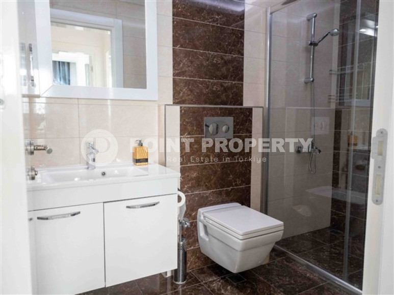 Bright modern apartment on the 7th floor with panoramic sea views in the center of the ecologically clean area of cozy Tosmur.-id-4253-photo-9